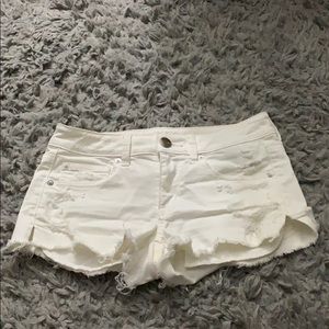 White distressed shorts